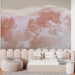 Fotobehang Pluizige roze wolken in de lucht.