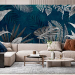 Fotobehang Tropische bladeren op groenblauwe achtergrond.
