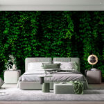 Fotobehang Levendige groene gebladerte muur achtergrond.