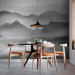 Fotobehang Mistig landschap met bergen