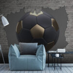 Fotobehang Voetbal barst door bakstenen muur.