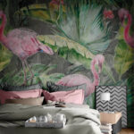 Fotobehang Roze flamingo en groene bladeren