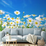 Fotobehang Veld met witte en gele bloemen