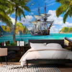 Fotobehang Piratenschip voor anker in tropisch paradijs.
