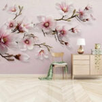 Fotobehang Roze magnolia's op elegante takken.