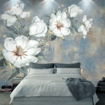 Fotobehang Witte bloemen op blauwe gestructureerde achtergrond.