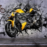 Fotobehang Motorfiets die door de muur breekt.