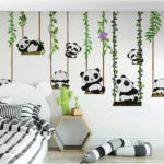 Fotobehang Groep panda's op schommels