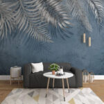 Fotobehang Zilverkleurige palmbladeren op blauwe achtergrond.