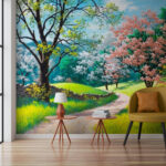 Fotobehang Zandweg door een grasveld met bomen