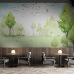 Fotobehang Groen veld met bomen en vogels in de lucht