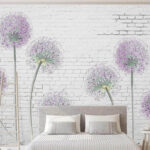 Fotobehang Bloesems tegen witte bakstenen achtergrond.