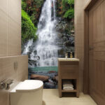 Fotobehang Majestueuze waterval te midden van weelderig groen