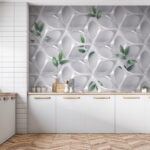 Fotobehang Witte muur met groene bladeren