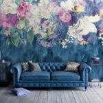 Fotobehang Bloementapijt over blauwe golven.