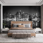 Fotobehang Skyline van de stad bij nacht met lichten die reflecteren op het water