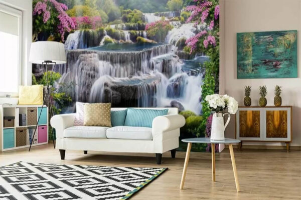 Betoverende waterval te midden van levendige bloesems Fotobehang Betoverende waterval te midden van levendige bloesems