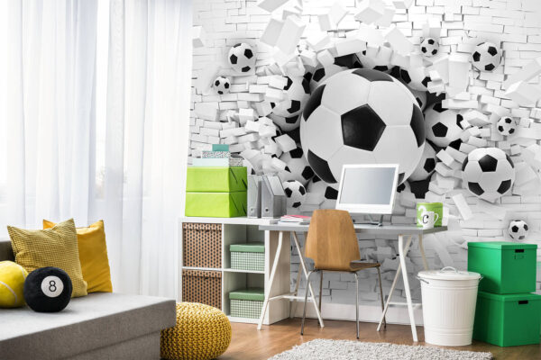 Voetballen barsten door de muur Fotobehang Voetballen barsten door de muur