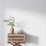 Fotobehang Witte achtergrond met zwarte stippen