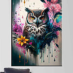 Canvas Schilderijen Levendige uil omringd door levendige bloemen.