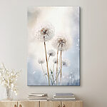 Canvas Schilderijen Drijvende paardenbloemen in dromerig licht.