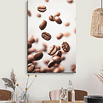 Canvas Schilderijen Zwevende koffiebonen in beweging.