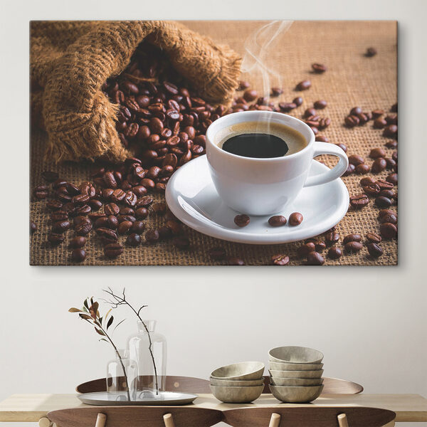 Kop koffie en een zak koffiebonen Canvas Schilderijen Kop koffie en een zak koffiebonen