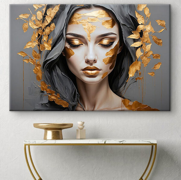 Vergulde bladeren omlijsten een sereen gezicht Canvas Schilderijen Vergulde bladeren omlijsten een sereen gezicht