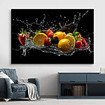 Canvas Schilderijen Spetterend fruit in levendige beweging