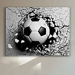 Canvas Schilderijen Voetbal die door een muur breekt