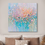 Canvas Schilderijen Schilderij van bloemen op een blauwe achtergrond