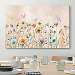 Canvas Schilderijen Kleurrijke vlinders dansen boven wilde bloemen