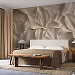 Fotobehang Snijwerk van witte bloemen op een muur