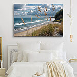 Canvas Schilderijen Strand met hoog gras en water
