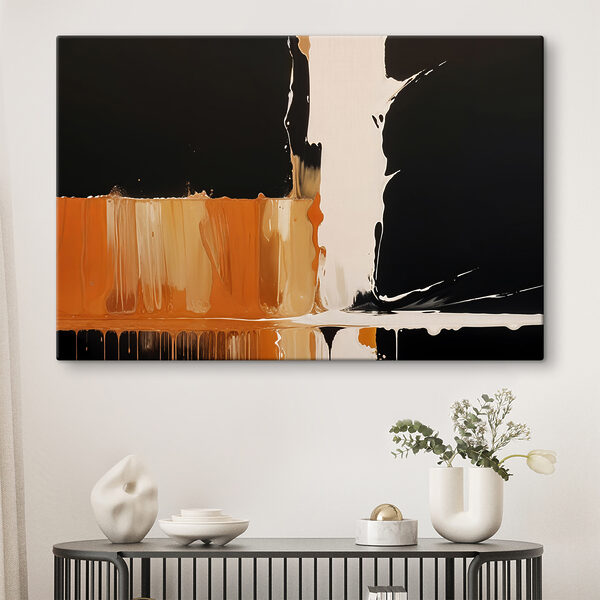 Witte en oranje verf druipend op een zwart oppervlak Canvas Schilderijen Witte en oranje verf druipend op een zwart oppervlak