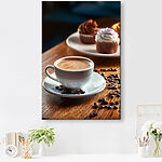 Canvas Schilderijen Kopje koffie en cupcakes op een tafel