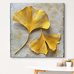 Canvas Schilderijen Gele bladeren op een wit oppervlak