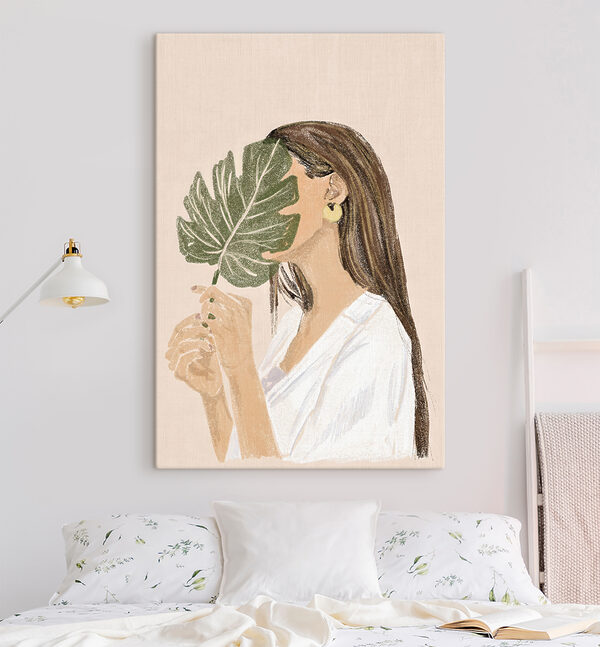 Vrouw die een blad vasthoudt Canvas Schilderijen Vrouw die een blad vasthoudt