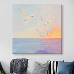 Canvas Schilderijen Schilderij van vogels vliegend over water