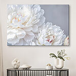 Canvas Schilderijen Witte bloemen in een delicate omhelzing.