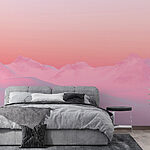 Fotobehang Roze en blauwe lucht boven een besneeuwde bergketen