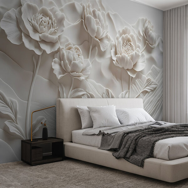 Snijwerk van witte bloemen op een muur Fotobehang Snijwerk van witte bloemen op een muur