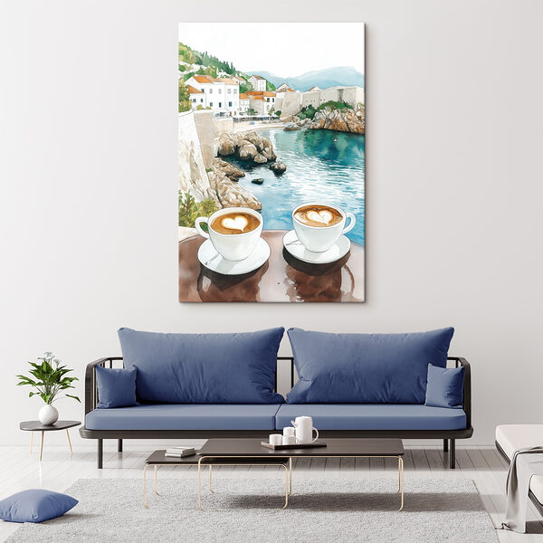 Twee kopjes koffie met een hartvormig schuim bovenop een tafel met uitzicht op een watermassa Canvas Schilderijen Twee kopjes koffie met een hartvormig schuim bovenop een tafel met uitzicht op een watermassa