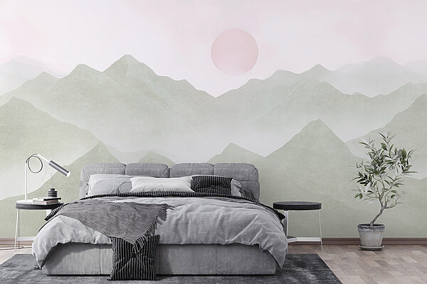 Bergketen met een zon in de verte Fotobehang Bergketen met een zon in de verte