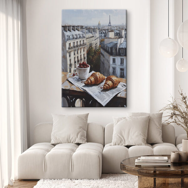 Kopje koffie en croissants op een tafel met gebouwen op de achtergrond Canvas Schilderijen Kopje koffie en croissants op een tafel met gebouwen op de achtergrond