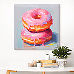 Canvas Schilderijen Twee donuts met roze glazuur