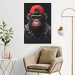 Canvas Schilderijen Chimpansee met rode hoed en jas