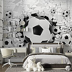Fotobehang Voetballen barsten door de muur