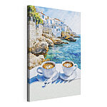 Canvas Schilderijen Twee kopjes koffie op een tafel bij het water
