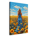 Canvas Schilderijen Vrouw in een blauwe jurk in een veld met zonnebloemen